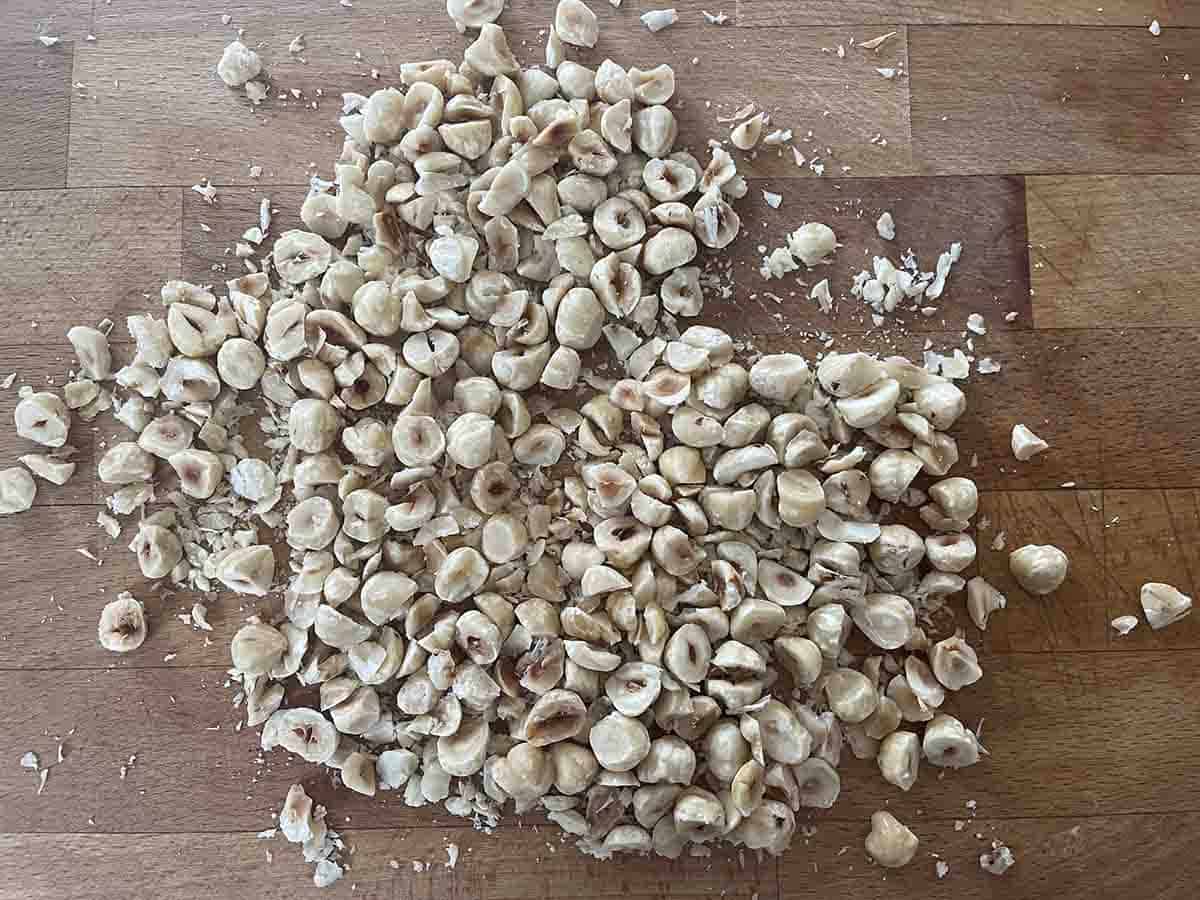 chopped hazelnuts on a board.