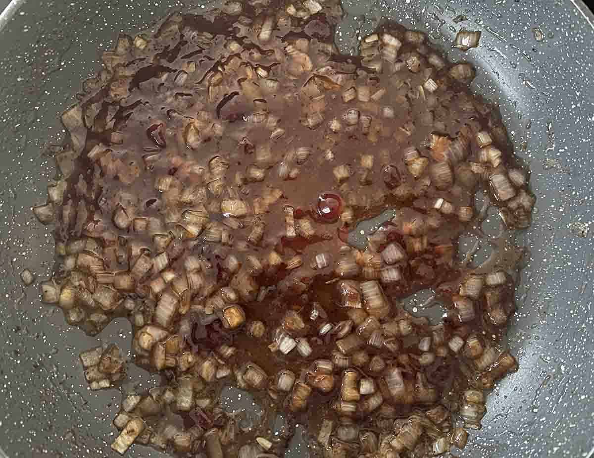 redcurrant jelly added to pan.