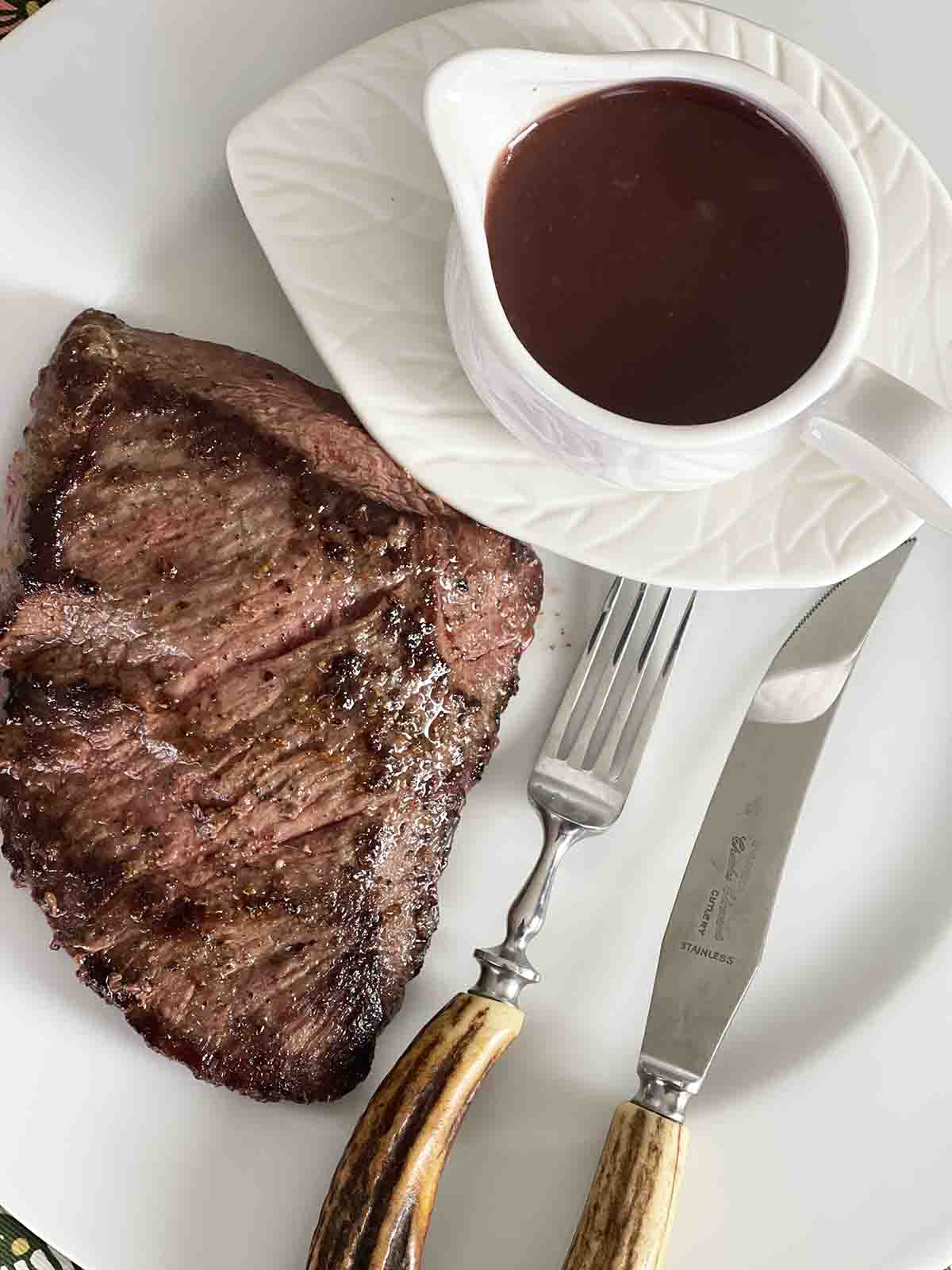haunch of veison with sauce.