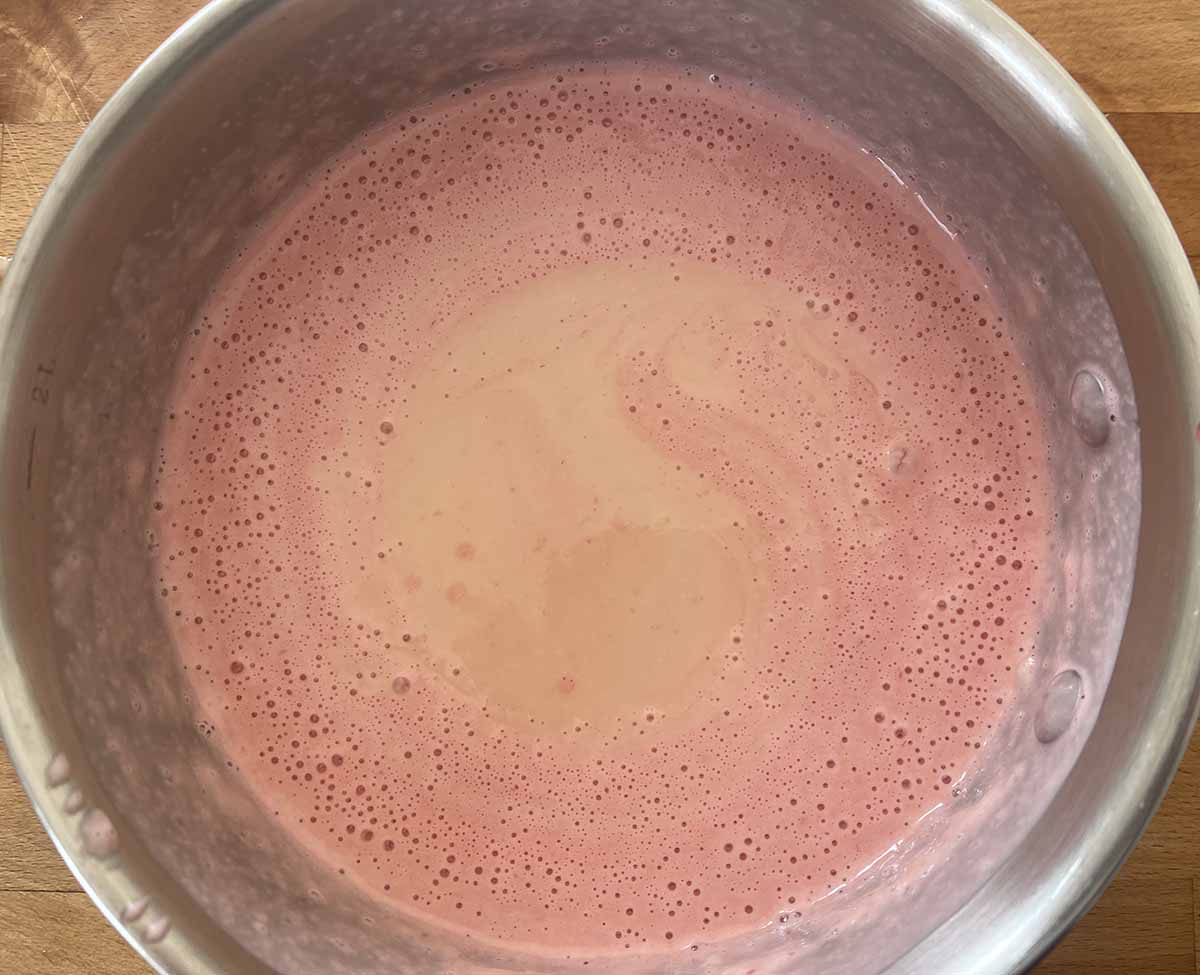 raspberry puree and lemon juice added to pan.