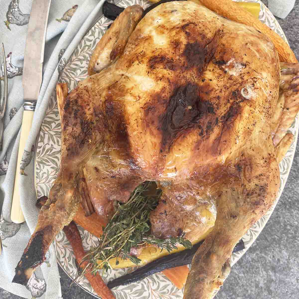 roast rooster on a platter.